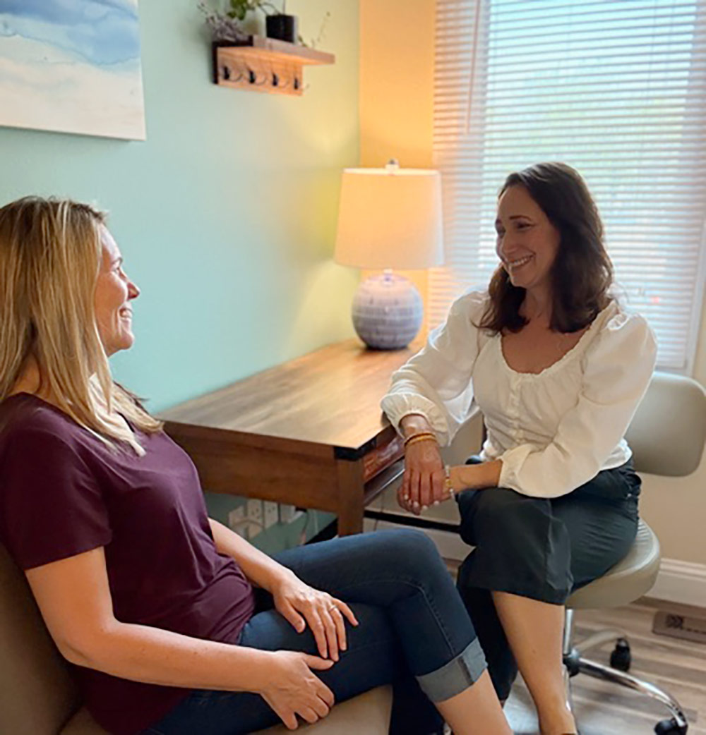 Dr. Margo Bachman with patient